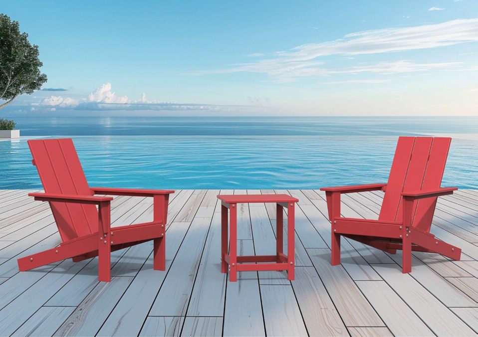 Red HDPE Adirondack chairs beside an infinity pool